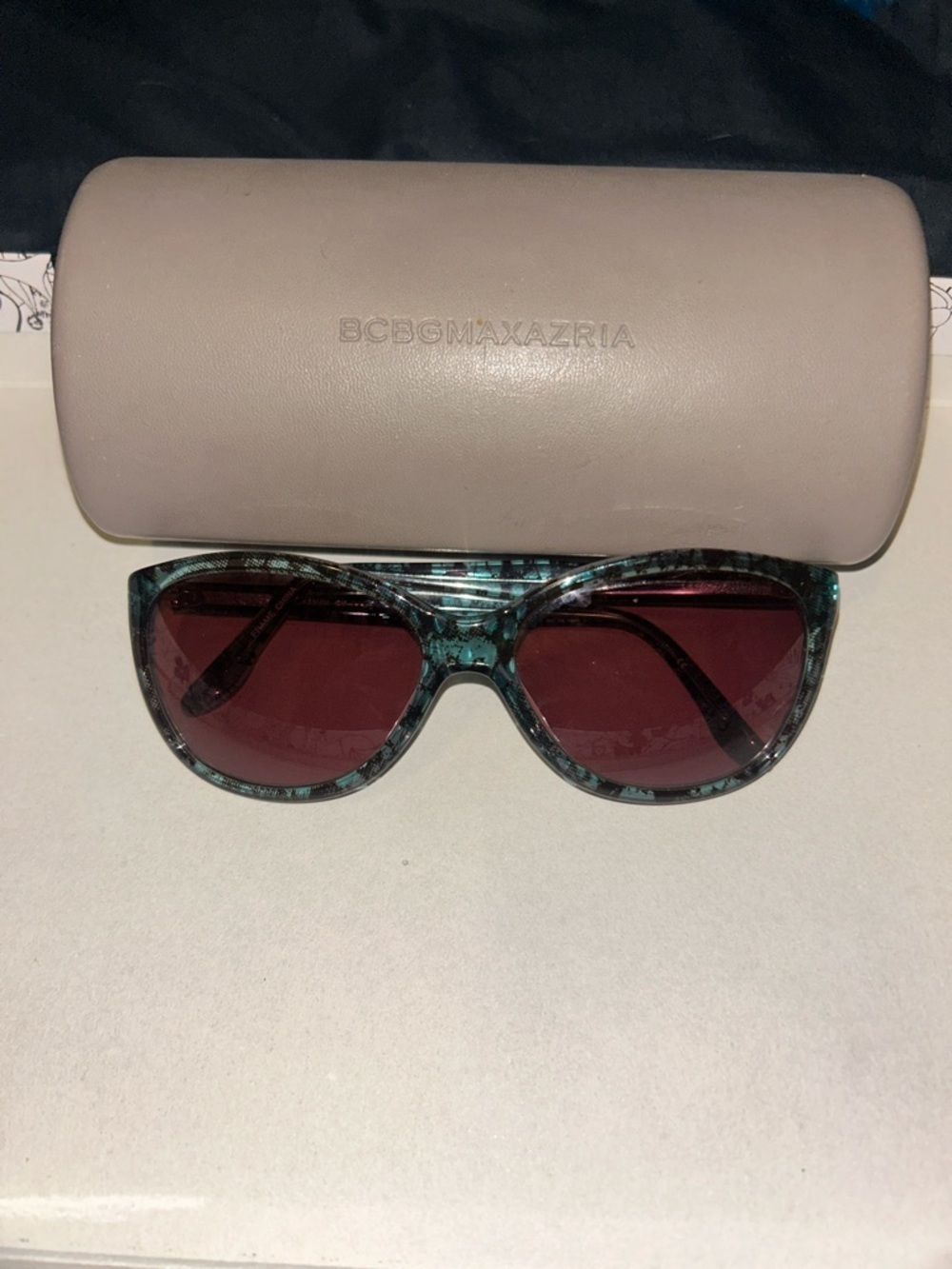 BCBGMaxAzria Teal Tortoise Frame Sunglasses with Burgundy Lenses